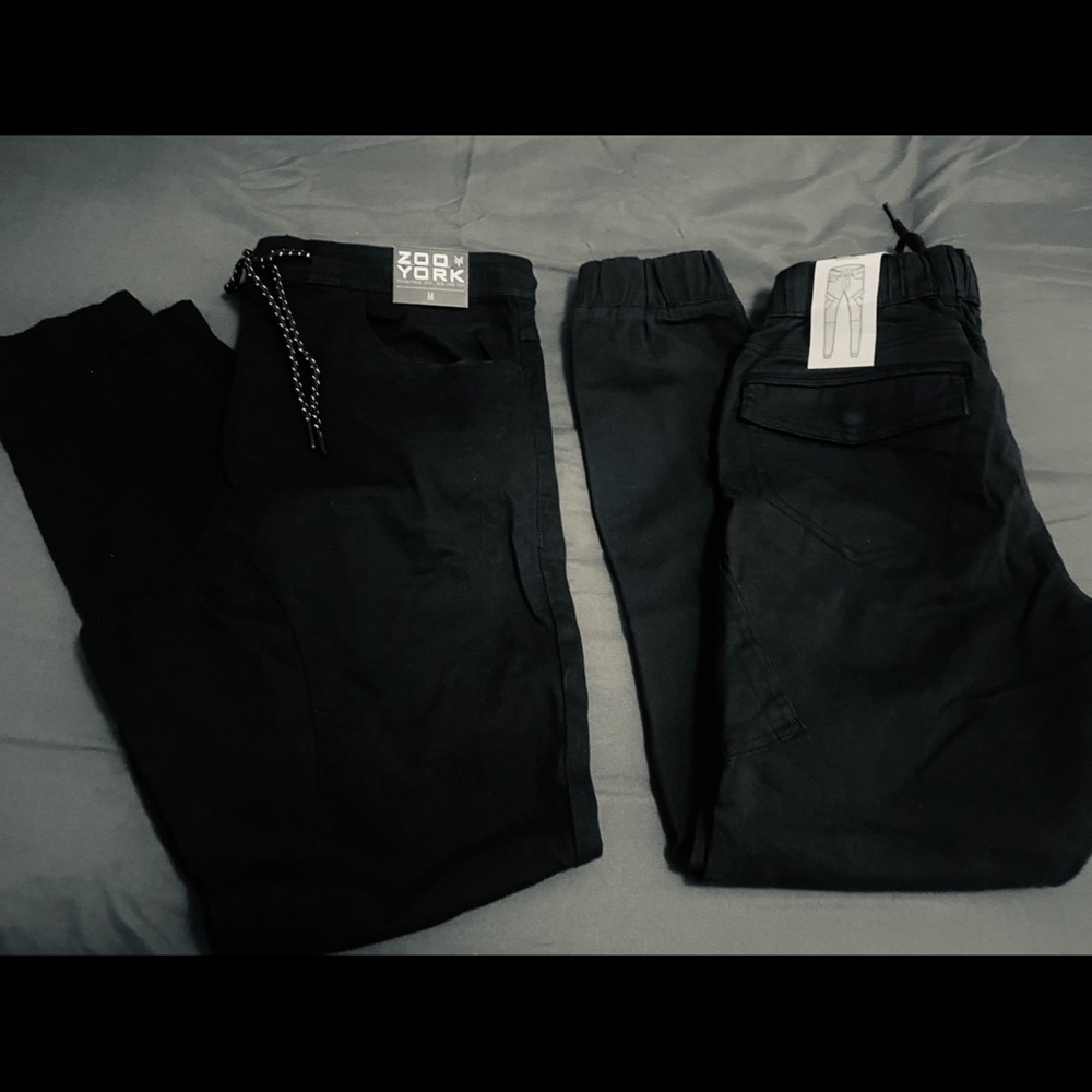 2 pairs black men’s joggers sz medium. West 49, Price for both pairs.